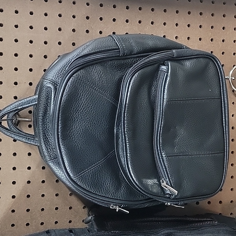 Back pack leather pocket book